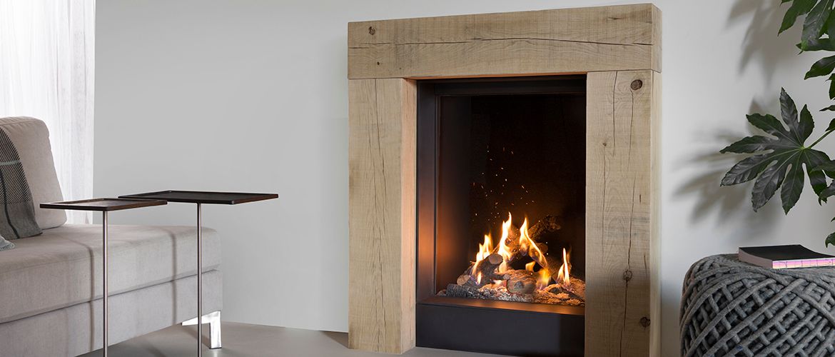 wooden fireplace surrounds installed in a contemporary home