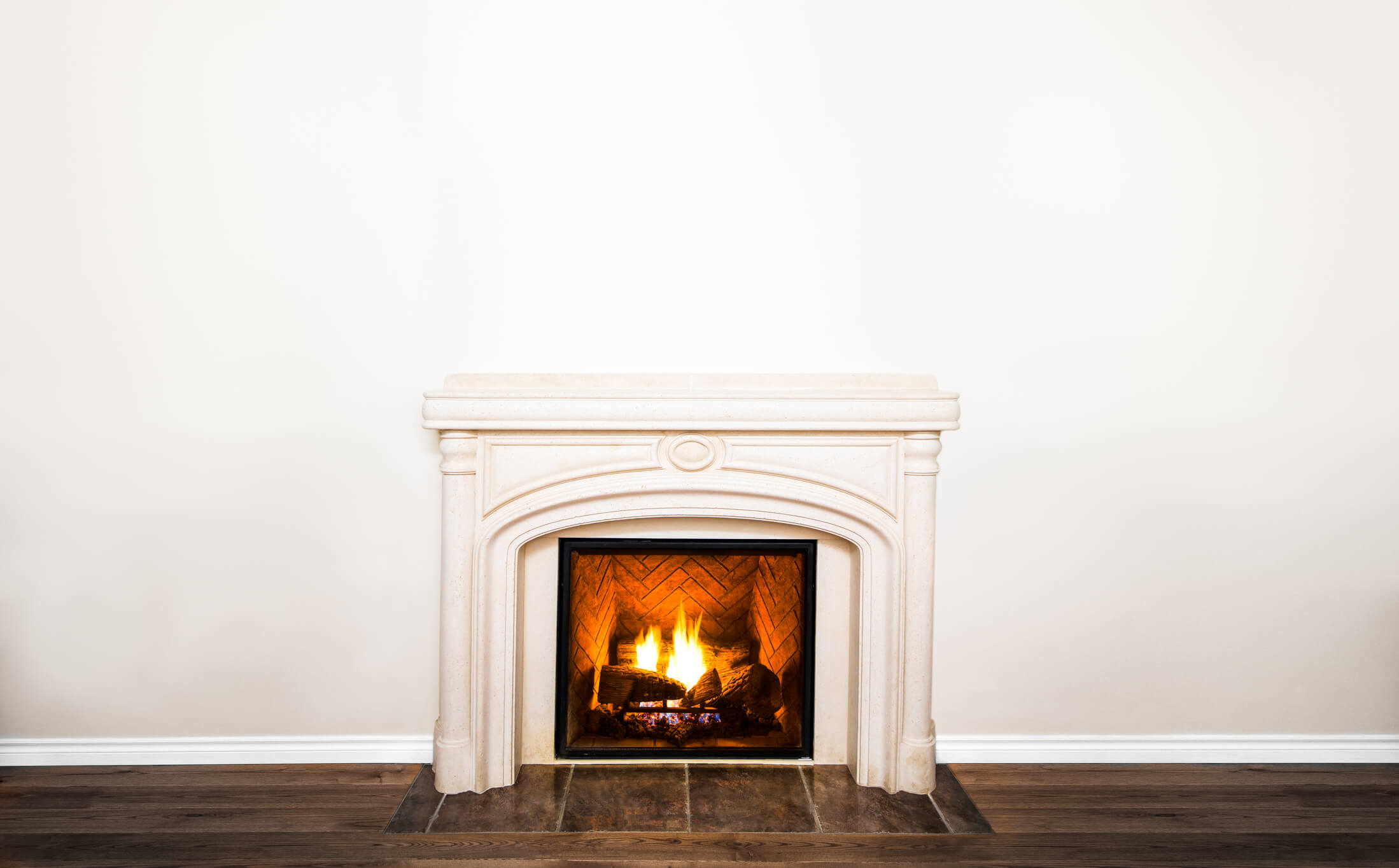 Luxurious White Marble Fireplace and empty wall